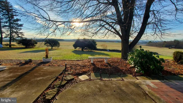 a view of a room that has a large window