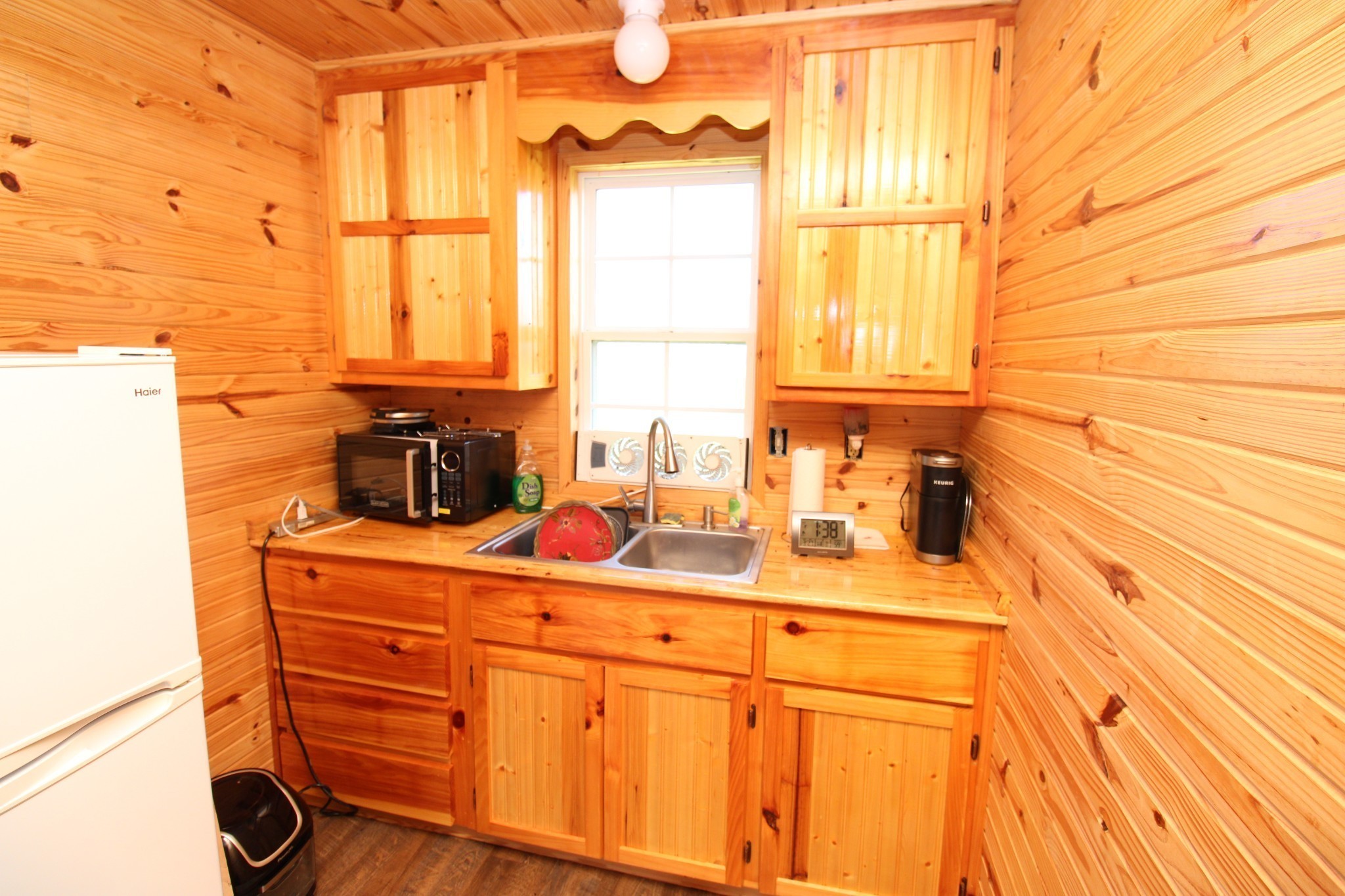 2271 East Stinson Road Lafayette, TN 37083 - Photo 12 of 50 a bathroom with a sink and a window
