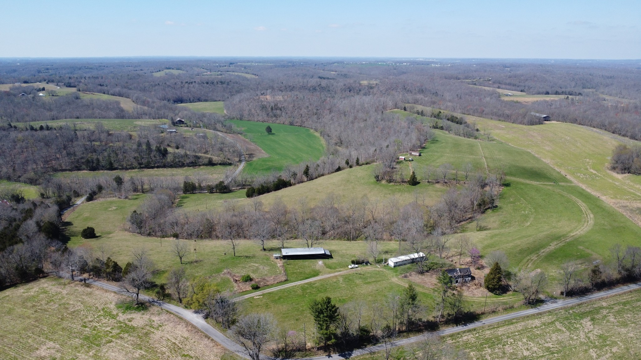 2271 East Stinson Road Lafayette, TN 37083 - Photo 26 of 50 an aerial view of a house with a yard