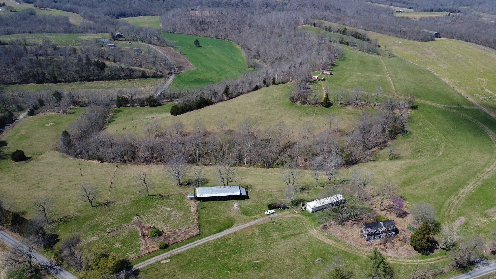 2271 East Stinson Road Lafayette, TN 37083 - Photo 29 of 50 an aerial view of a house with a yard