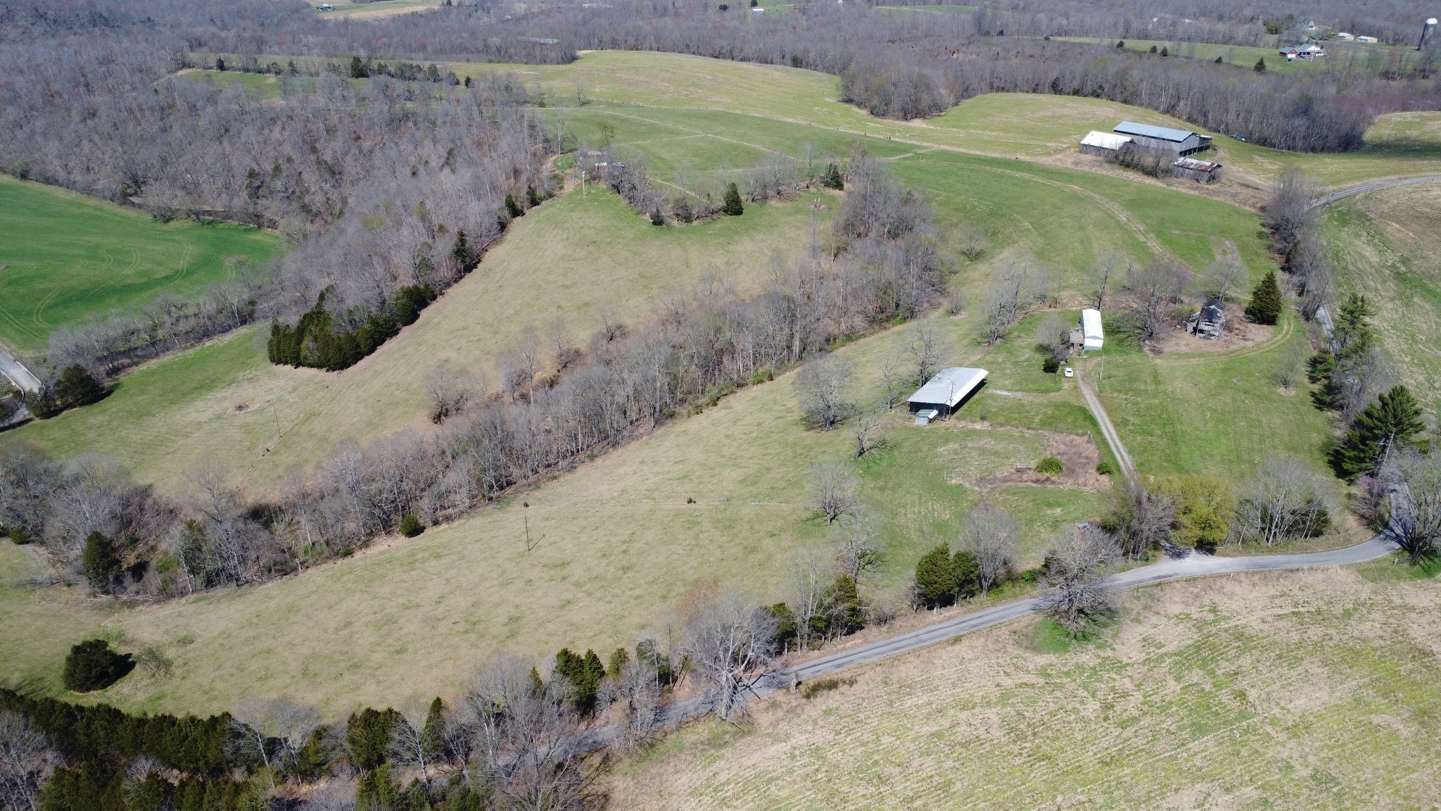 2271 East Stinson Road Lafayette, TN 37083 - Photo 31 of 50 a view of a road with a yard