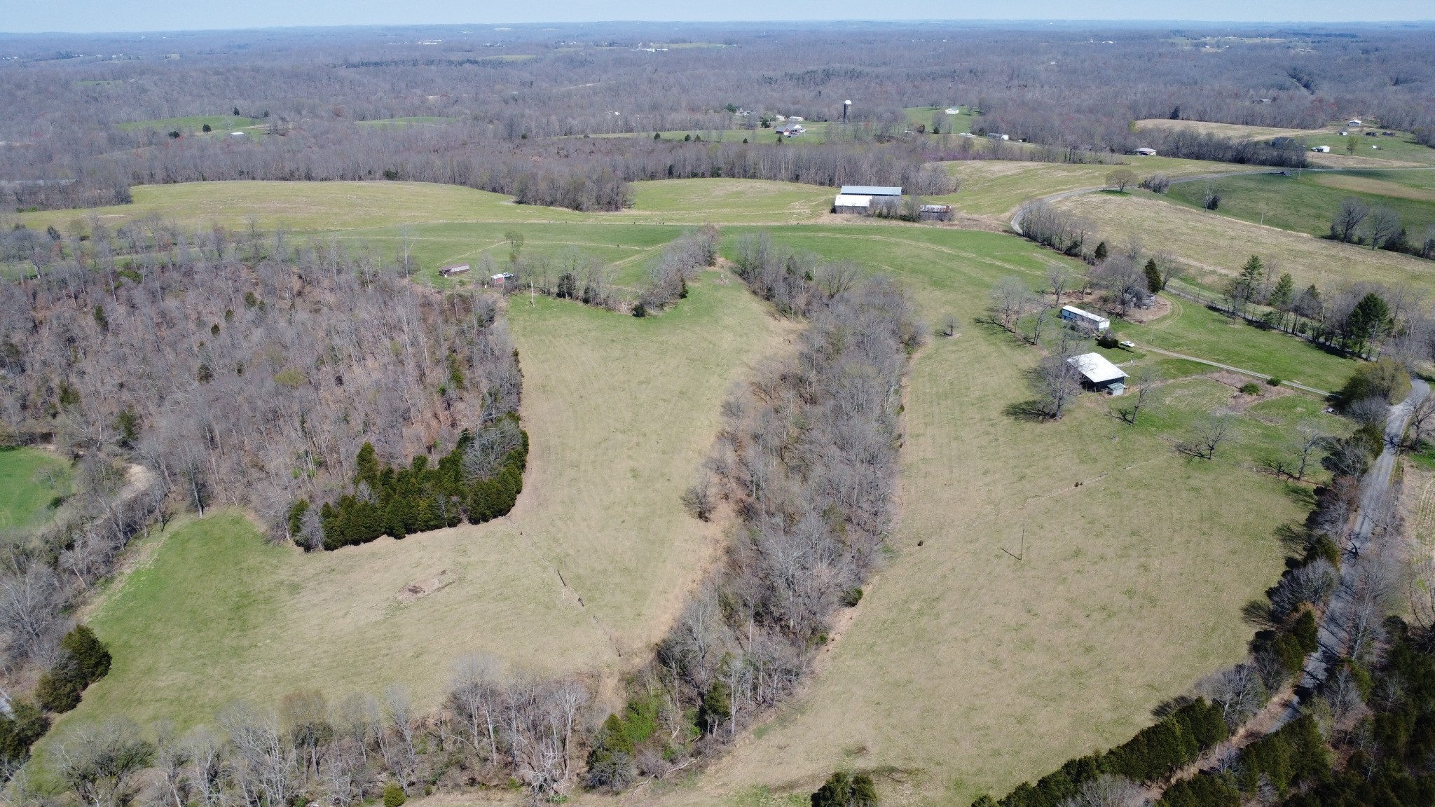 2271 East Stinson Road Lafayette, TN 37083 - Photo 33 of 50 an aerial view of a houses with a yard