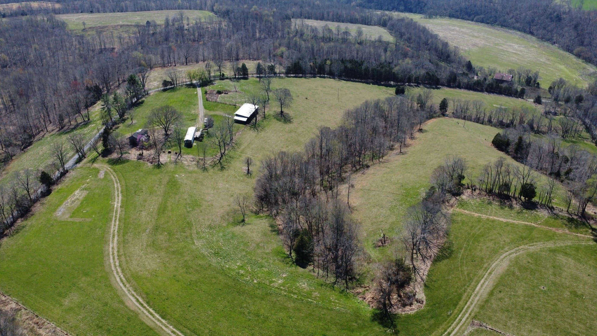 2271 East Stinson Road Lafayette, TN 37083 - Photo 45 of 50 an aerial view of a house with a yard