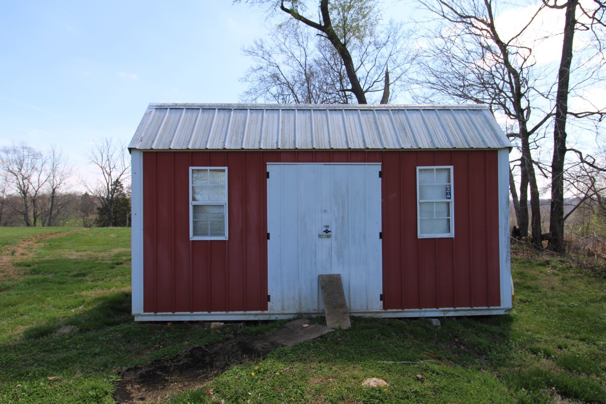 2271 East Stinson Road Lafayette, TN 37083 - Photo 49 of 50 a front view of a house with garden