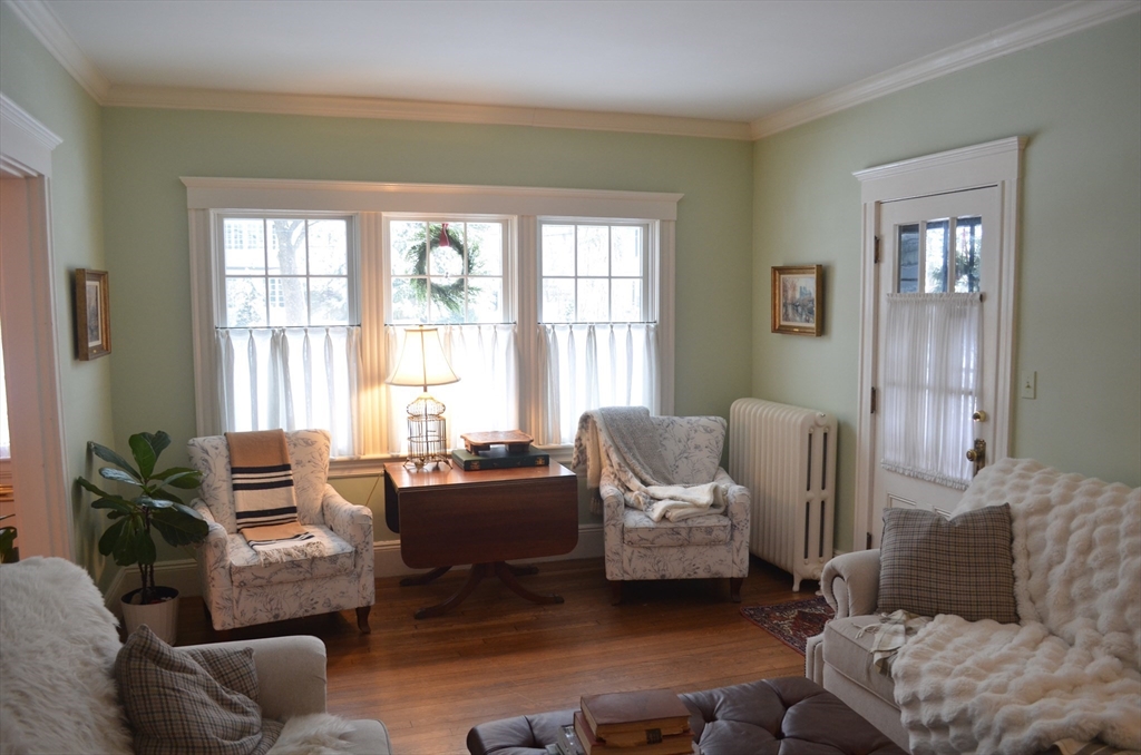 10 Berwick Road Lexington, MA 02420 - Photo 1 of 19 a living room with furniture and a large window