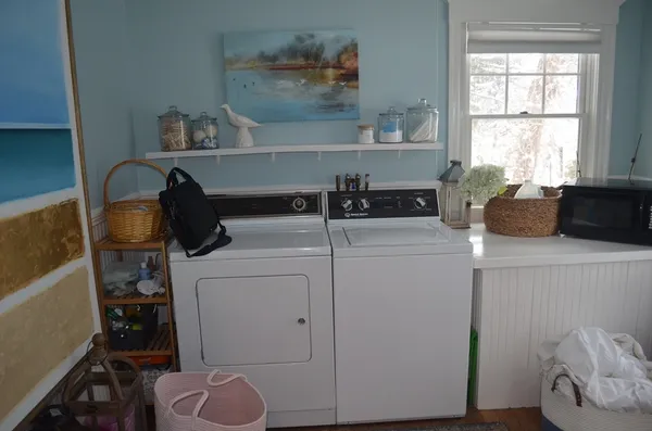 a kitchen with a cabinets and appliances