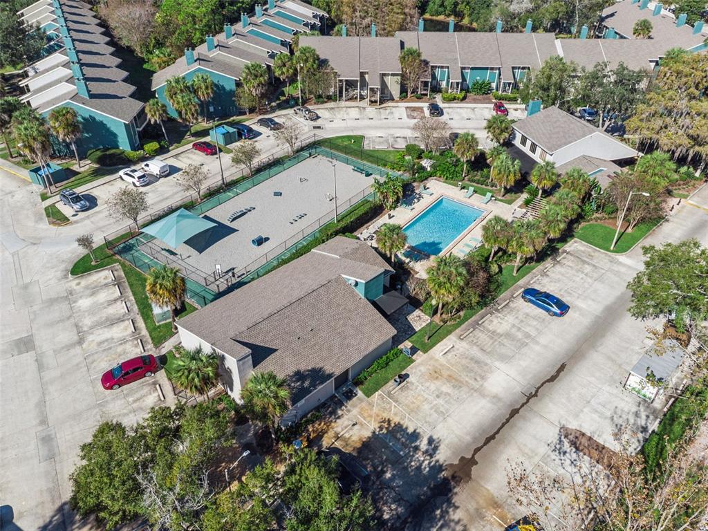 40 Moree Loop, Unit 7 Winter Springs, FL 32708 - Photo 30 of 31 an aerial view of a house with a yard and lake view