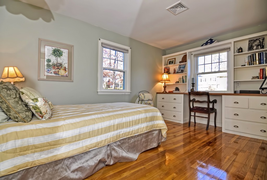 13 Phyllis Road Foxboro, MA 02035 - Photo 14 of 30 a bedroom with a bed and a dresser in it