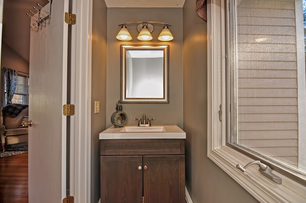 13 Phyllis Road Foxboro, MA 02035 - Photo 19 of 30 a bathroom with a sink and a mirror