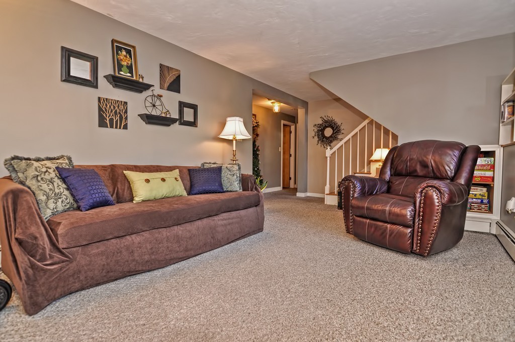 13 Phyllis Road Foxboro, MA 02035 - Photo 20 of 30 a living room with furniture and a couch