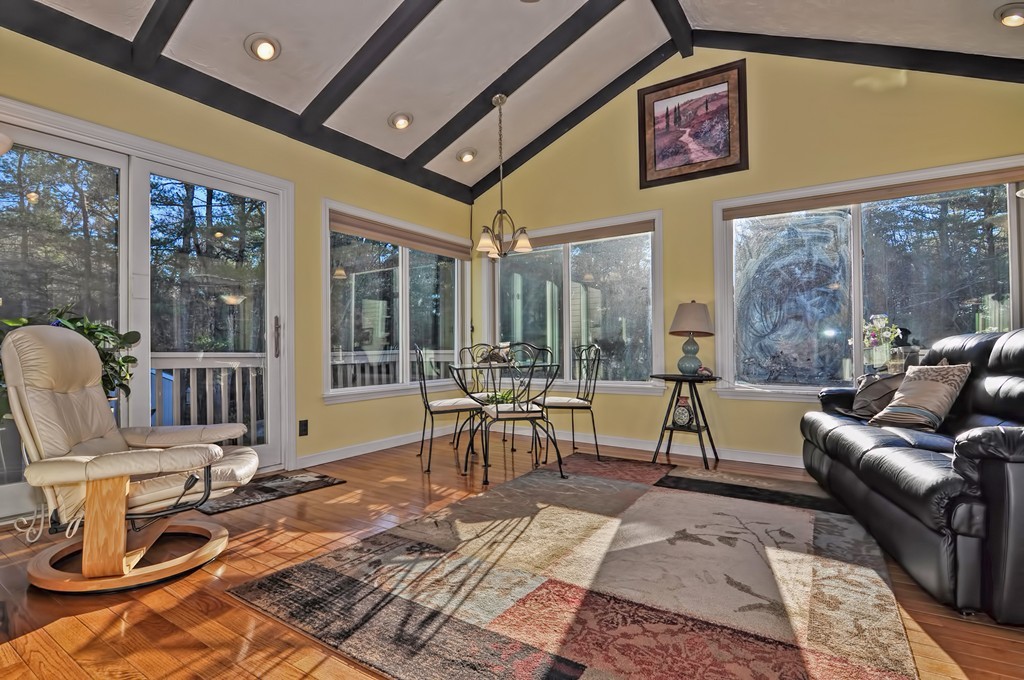 13 Phyllis Road Foxboro, MA 02035 - Photo 8 of 30 a living room with furniture and a floor to ceiling window