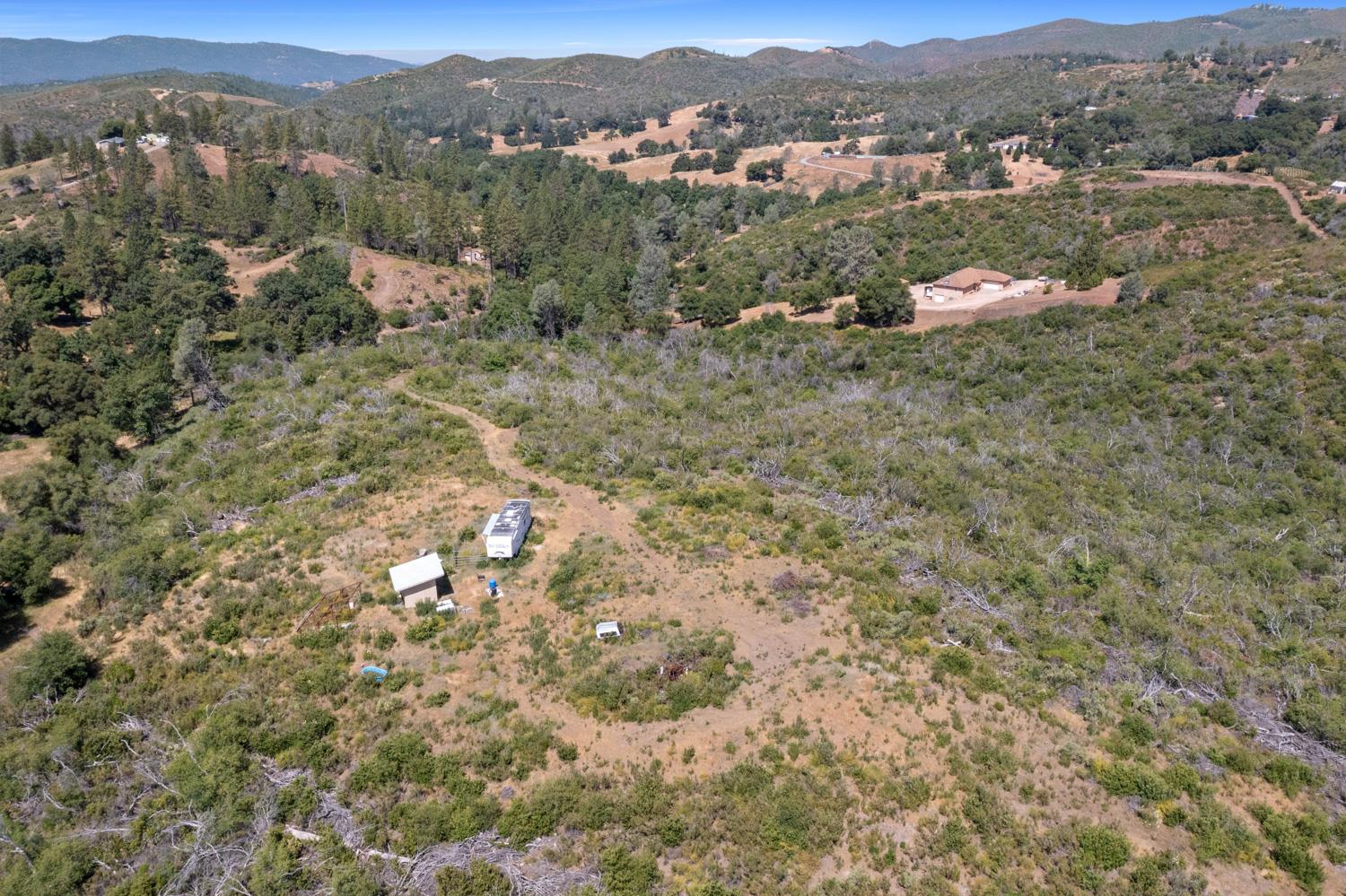 6165 Blue Eagle Mine Road Mountain Ranch, CA 95246 - Photo 5 of 13 an aerial view of a house with a yard