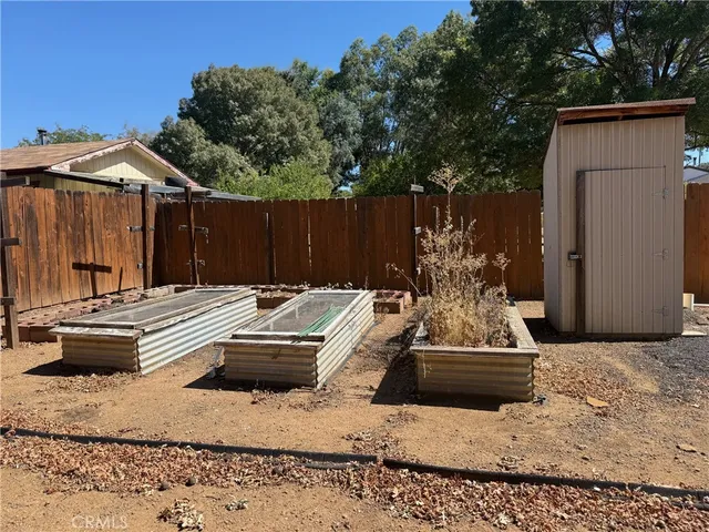 a view of swimming pool with patio