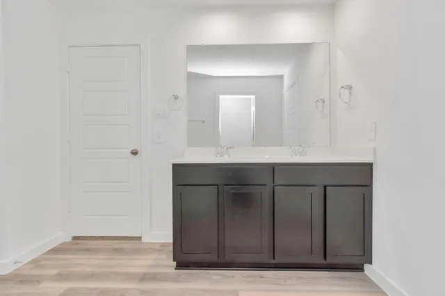 a view of entryway with wooden floor
