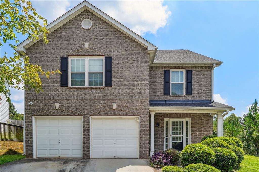 3836 Riverside Parkway Decatur, GA 30034 - Photo 1 of 1 a front view of a house with a yard
