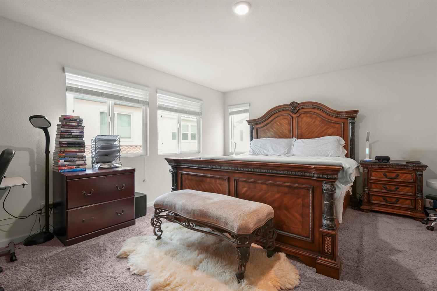 11789 Socrates Way Rancho Cordova, CA 95742 - Photo 13 of 23 a bedroom with a bed and furniture