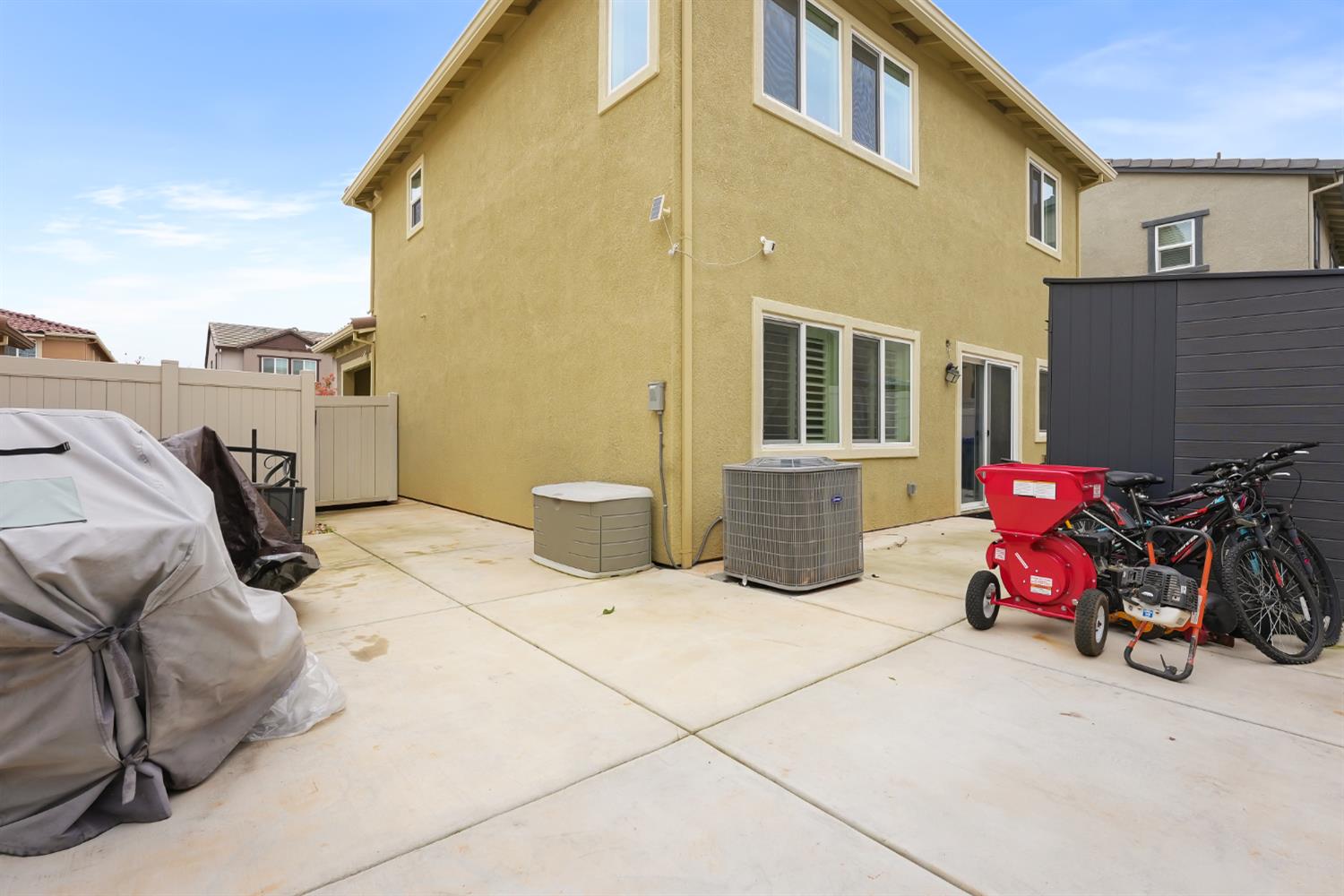 11789 Socrates Way Rancho Cordova, CA 95742 - Photo 19 of 23 a view of a house with many windows