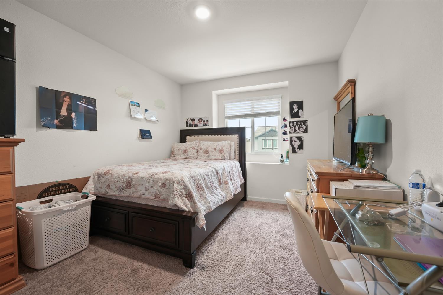 11789 Socrates Way Rancho Cordova, CA 95742 - Photo 10 of 23 a bedroom with a bed and a couch