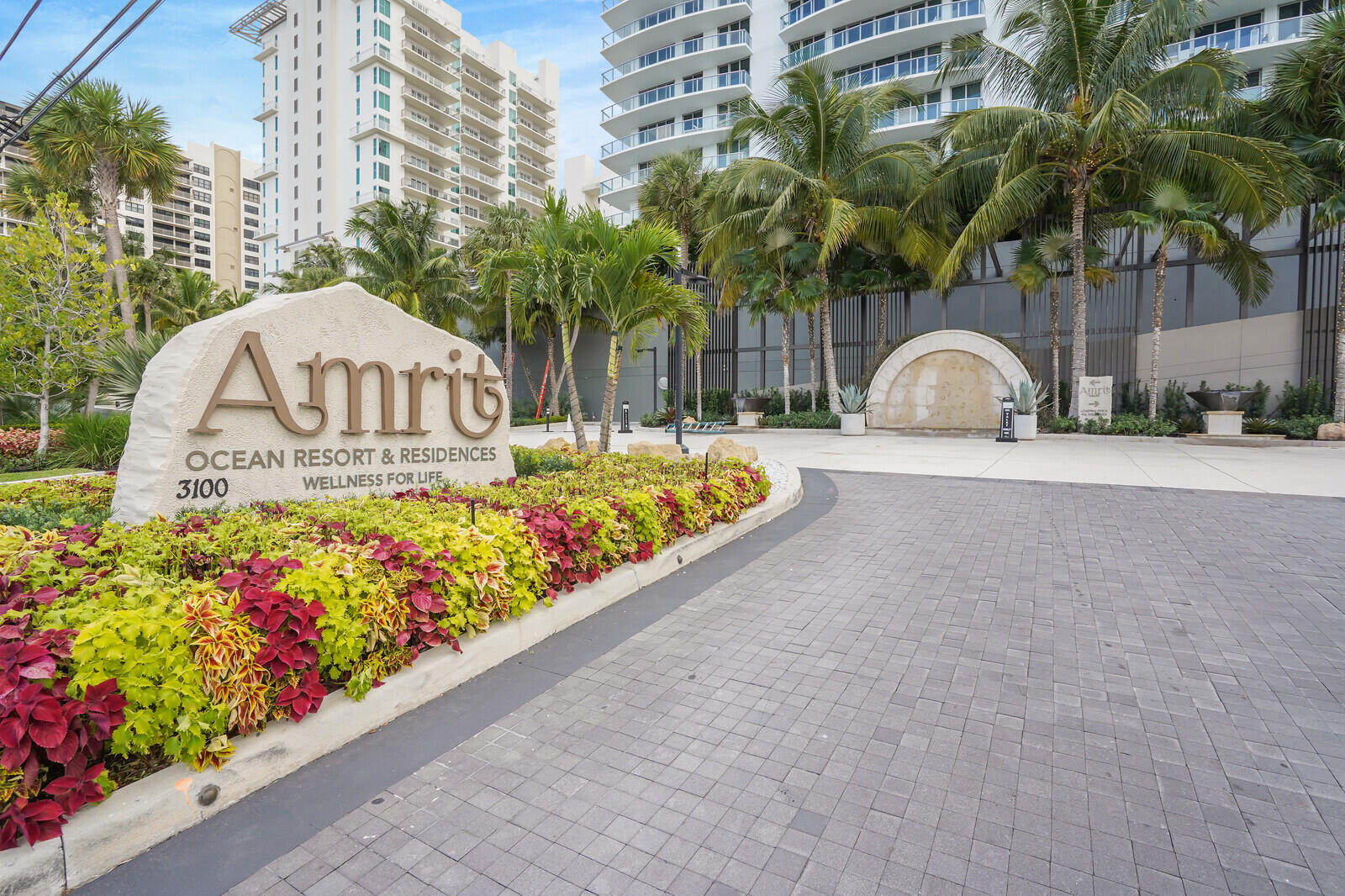 3100 North Ocean Drive, Unit 1202P Singer Island, FL 33404 - Photo 2 of 17 a view of a garden with flowers