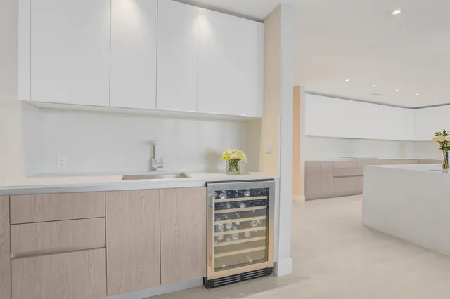a kitchen with a cabinets and appliances