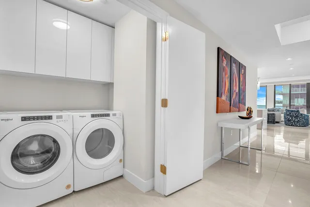 a view of living room washer and dryer