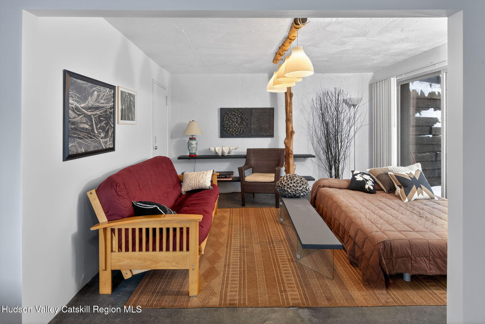 166 Todd Hill Road, Unit 166 West Kill, NY 12492 - Photo 12 of 42 a living room with furniture and a window