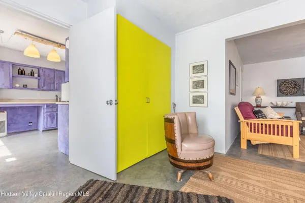 a living room with a couch and a table