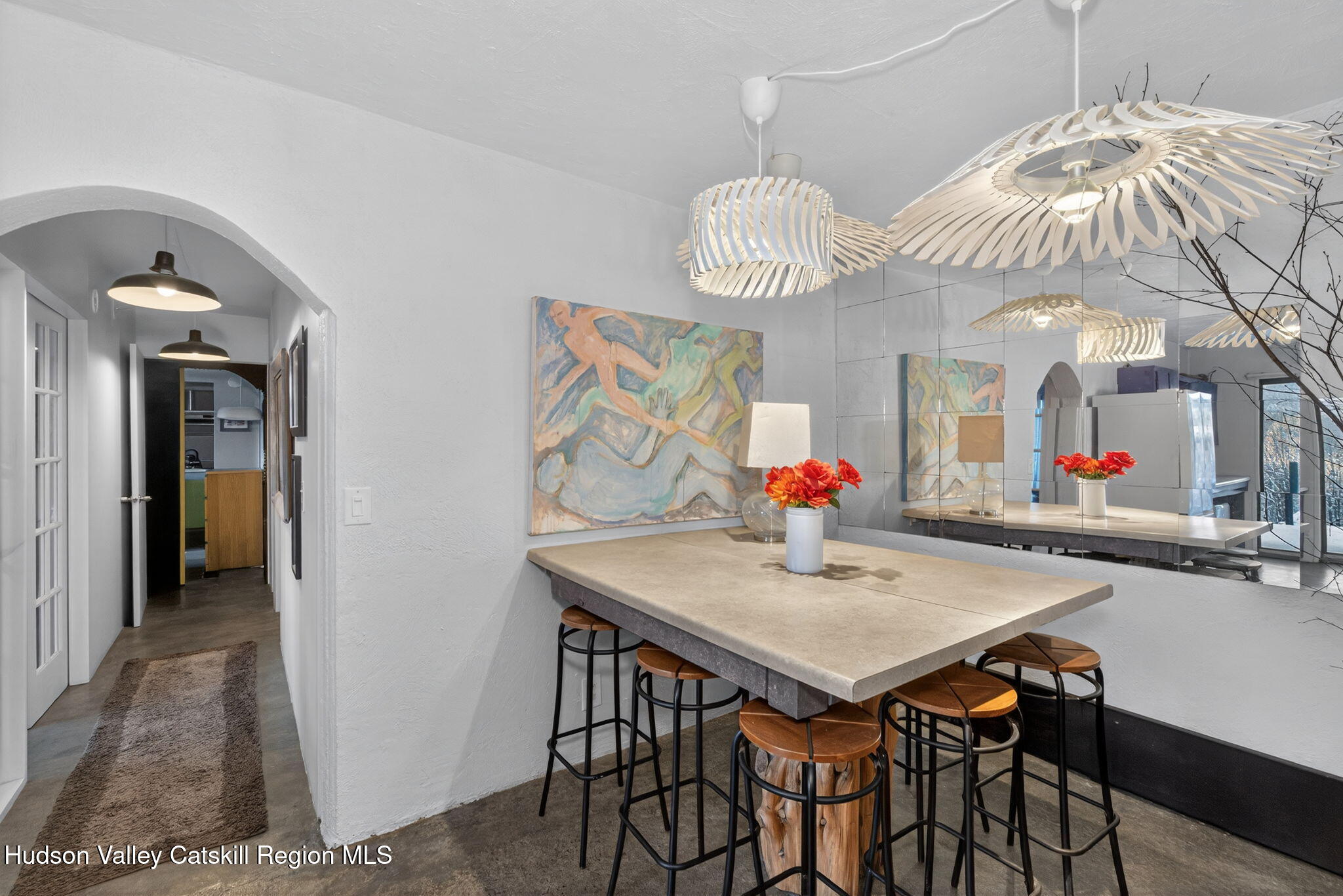 166 Todd Hill Road, Unit 166 West Kill, NY 12492 - Photo 18 of 42 a view of a dining room with furniture and chandelier