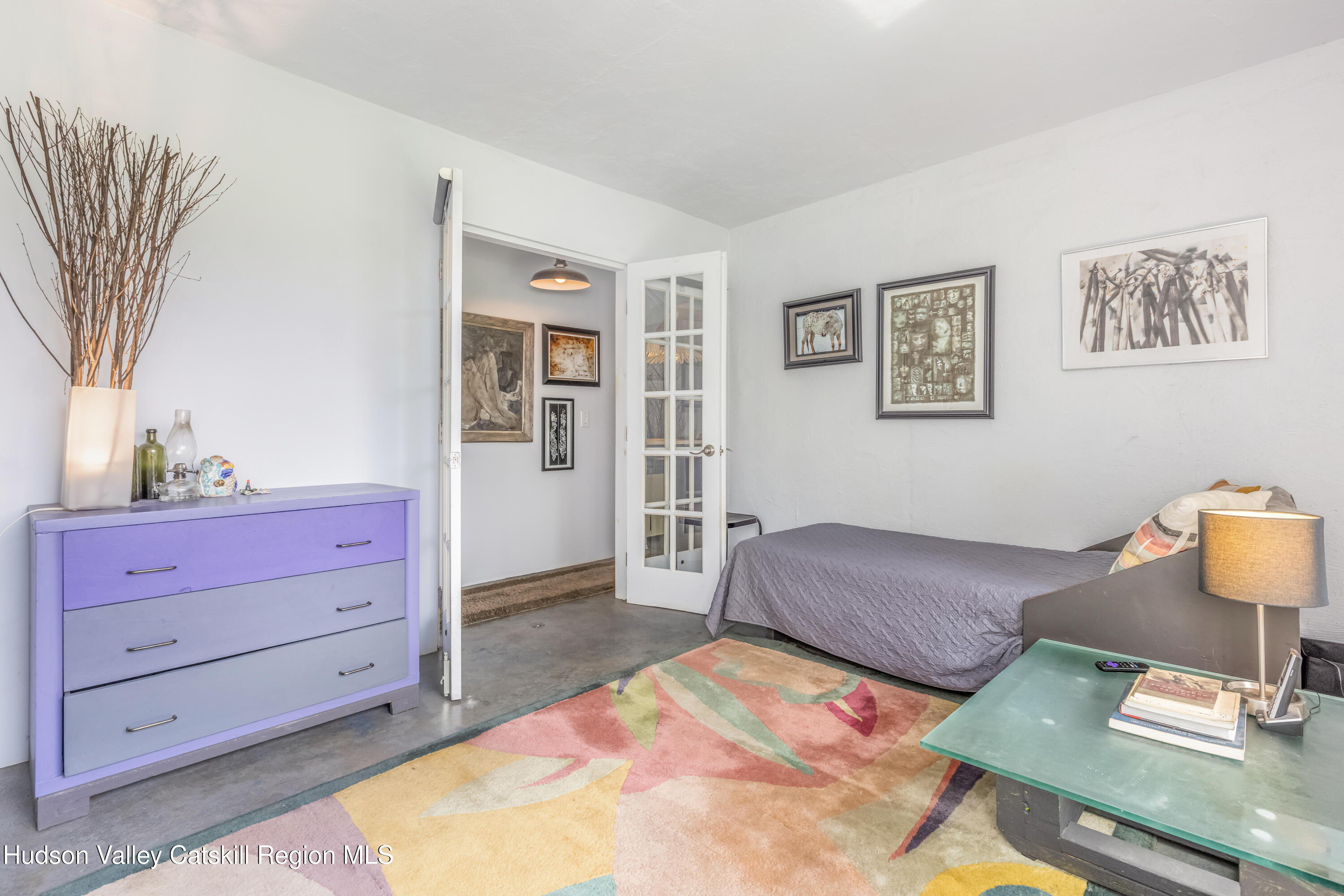 166 Todd Hill Road, Unit 166 West Kill, NY 12492 - Photo 20 of 42 a living room with furniture and wooden floor