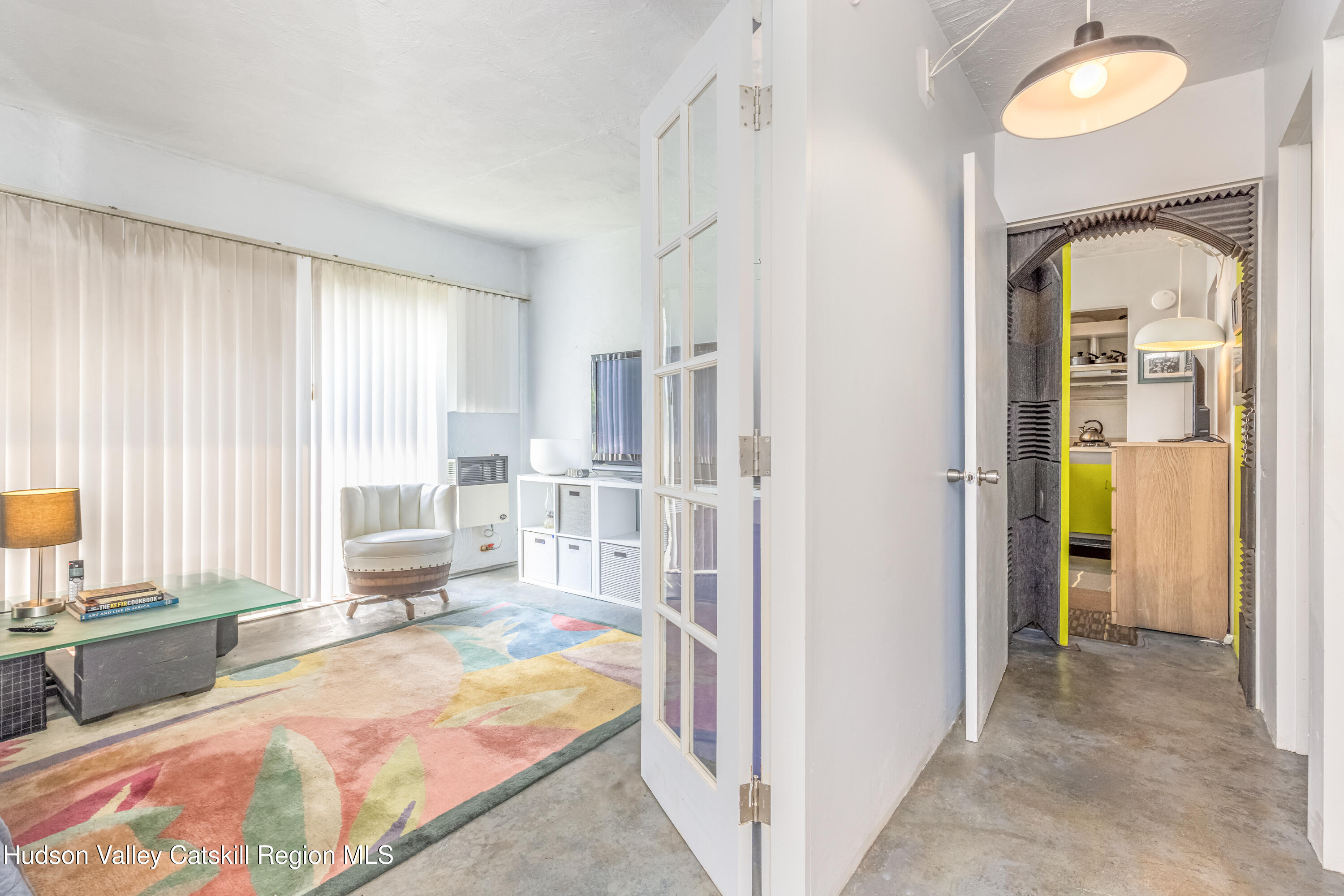 166 Todd Hill Road, Unit 166 West Kill, NY 12492 - Photo 24 of 42 a bedroom with furniture and a large window