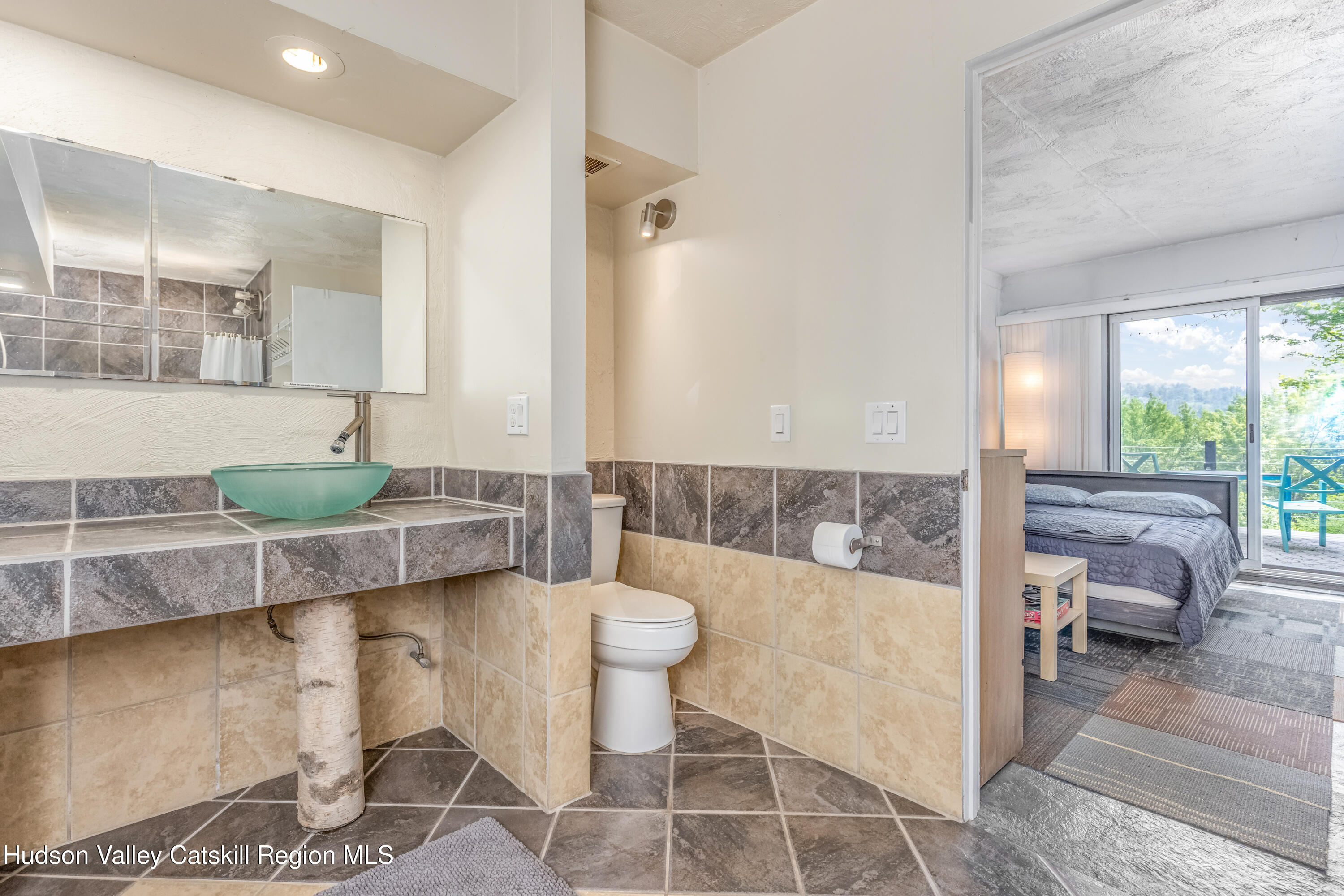 166 Todd Hill Road, Unit 166 West Kill, NY 12492 - Photo 27 of 42 a living room with furniture and a large window