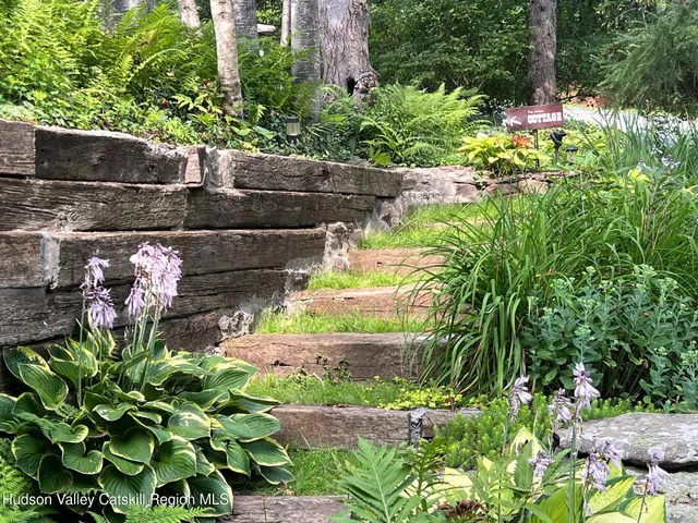 a green field with flowers