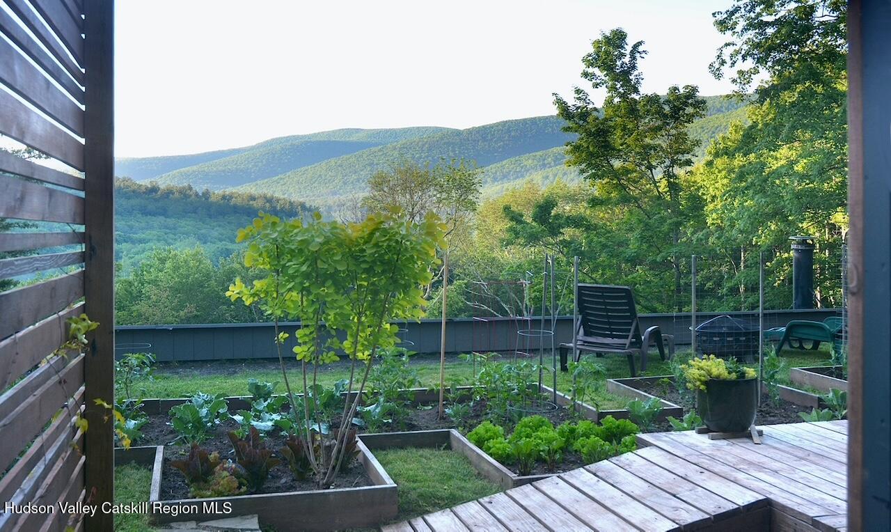 166 Todd Hill Road, Unit 166 West Kill, NY 12492 - Photo 33 of 42 a view of house with a backyard and garden