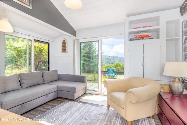 a room with furniture and window