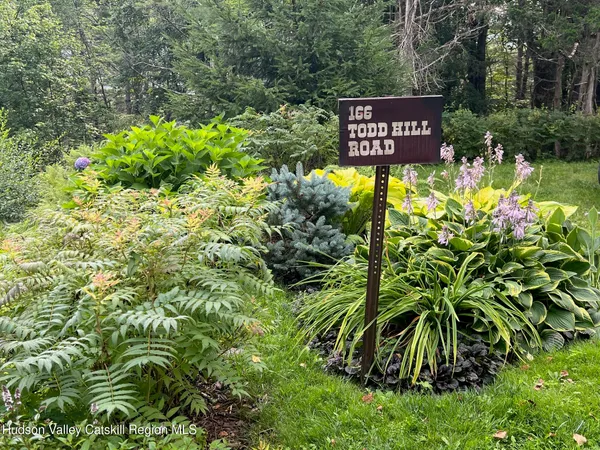 a view of a sign in a garden
