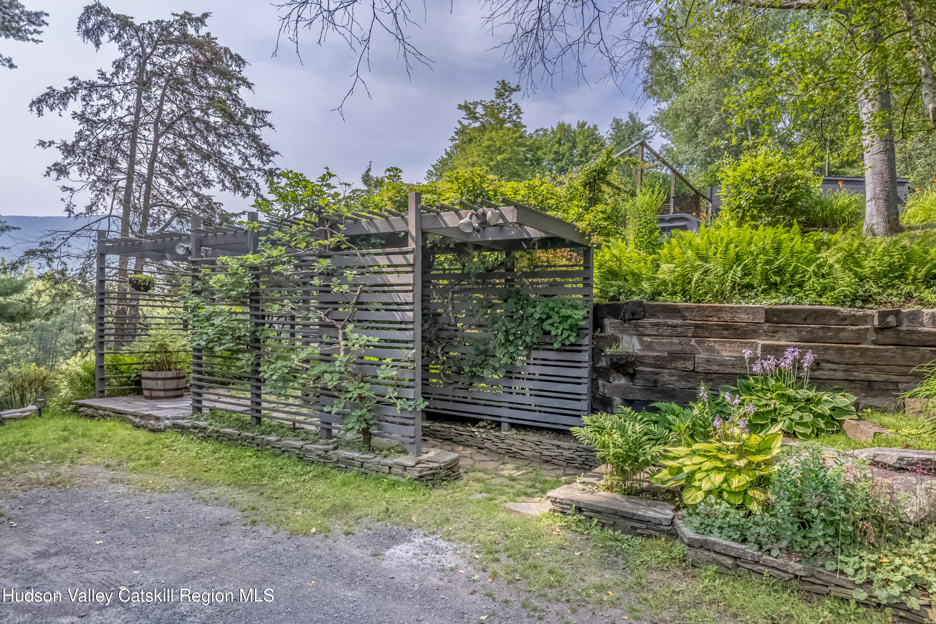 166 Todd Hill Road, Unit 166 West Kill, NY 12492 - Photo 7 of 42 a backyard of a house with lots of green space