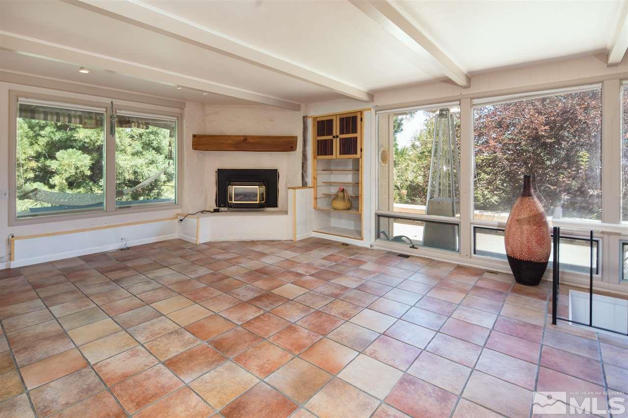 4321 Bridle Way Reno, NV 89519 - Photo 14 of 25 a view of a livingroom with furniture window and outside view