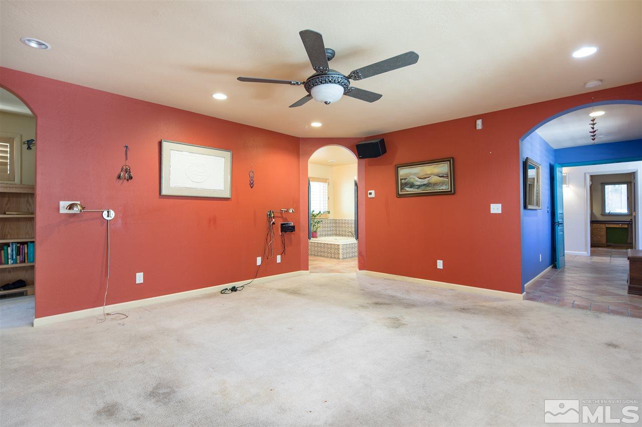 4321 Bridle Way Reno, NV 89519 - Photo 19 of 25 a view of an empty room with a ceiling fan