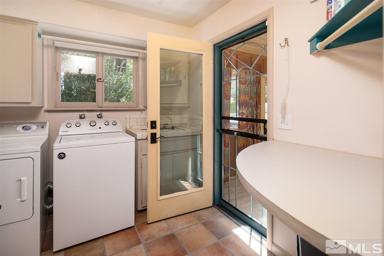 4321 Bridle Way Reno, NV 89519 - Photo 23 of 25 a utility room with dryer and washer