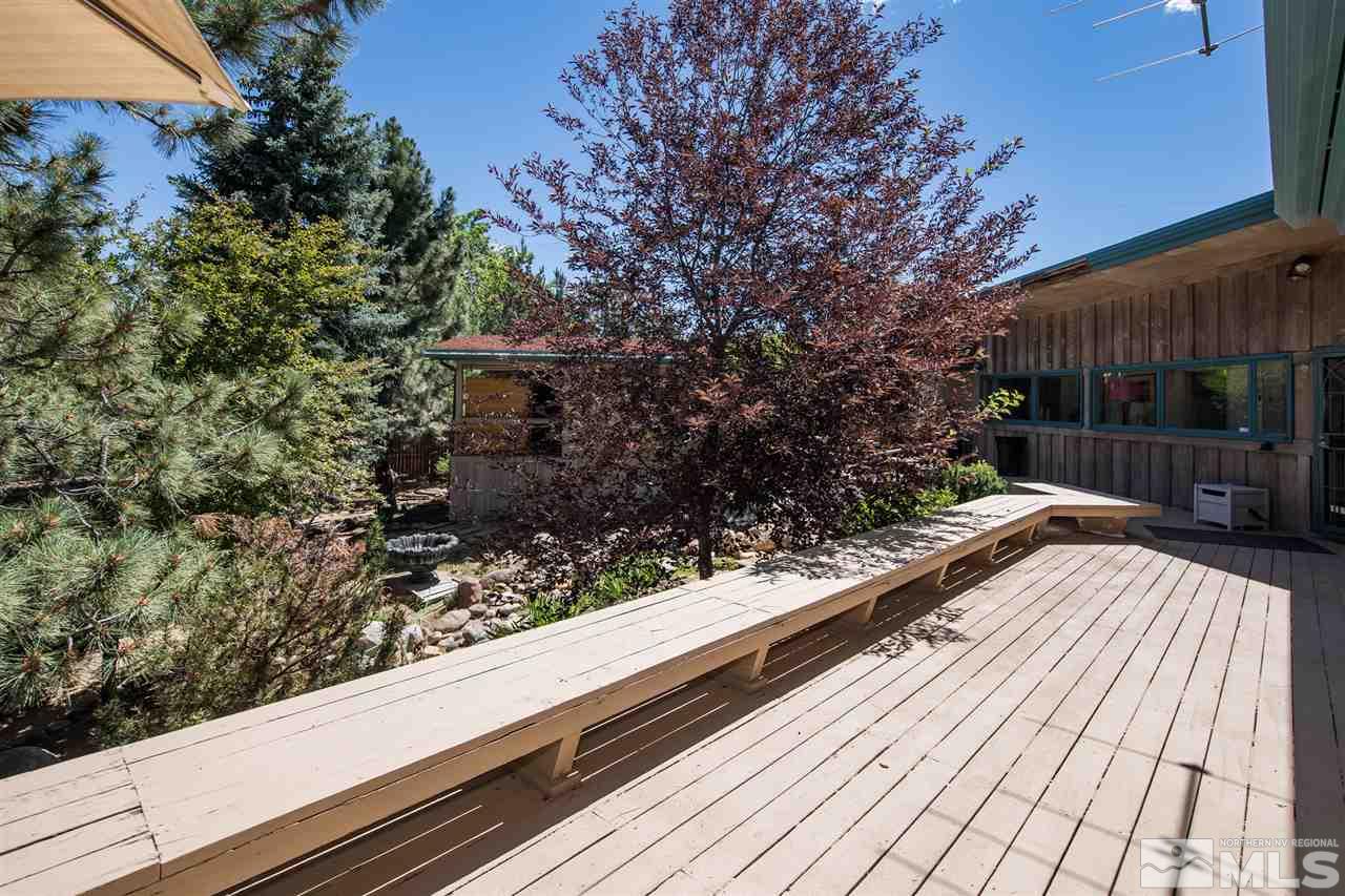 4321 Bridle Way Reno, NV 89519 - Photo 6 of 25 a view of a wooden floor and a bench