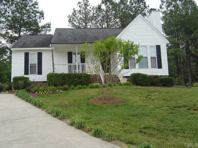 4420 Canadian Court Raleigh, NC 27616 - Photo 1 of 5 a front view of a house with a garden