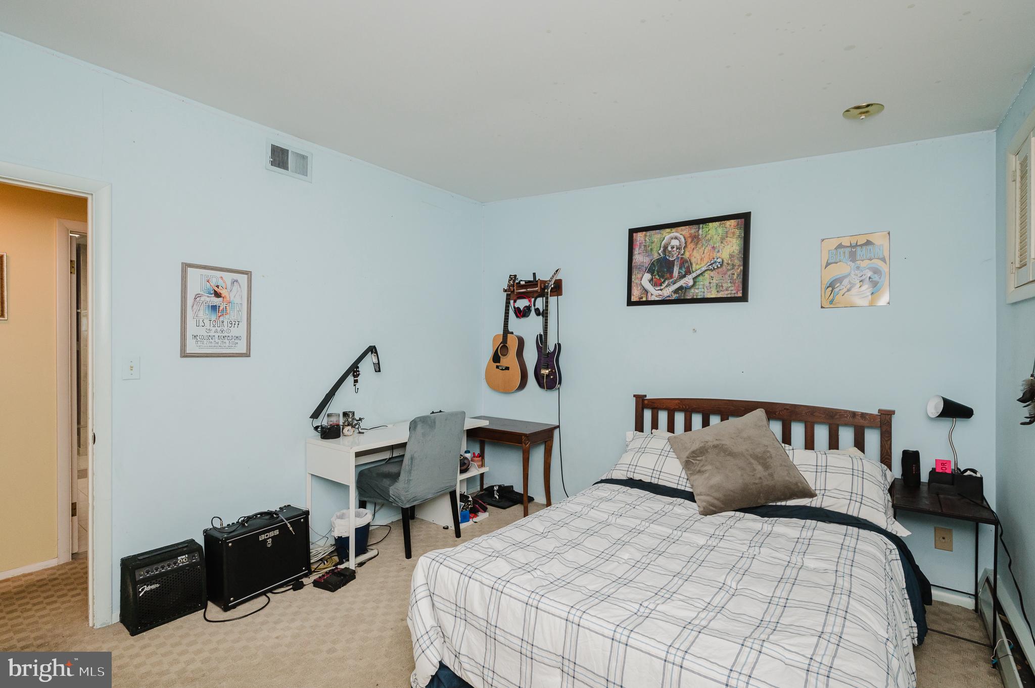 3228 Midfield Road Pikesville, MD 21208 - Photo 27 of 42 Charming bedroom with artistic flair.