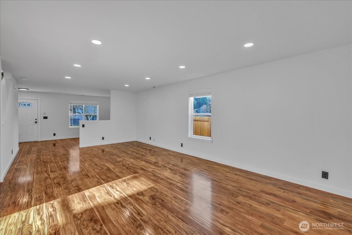 414 Easy Street Rainier, WA 98576 - Photo 20 of 38 a view of a room with wooden floor and white walls