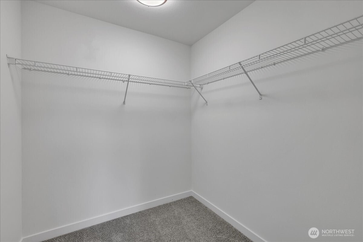 414 Easy Street Rainier, WA 98576 - Photo 24 of 38 a view of a room with racks on the wall