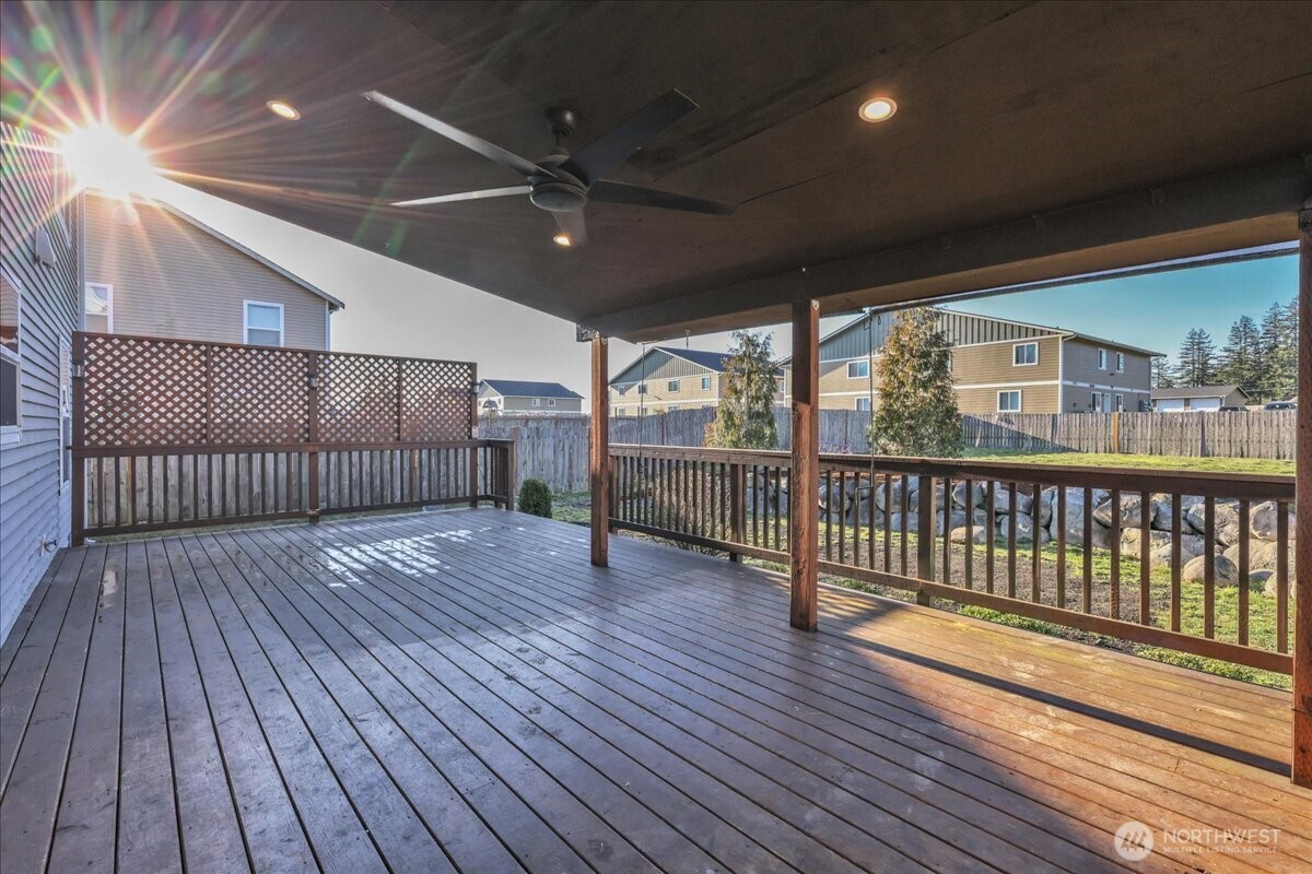414 Easy Street Rainier, WA 98576 - Photo 30 of 38 a view of porch with wooden floor