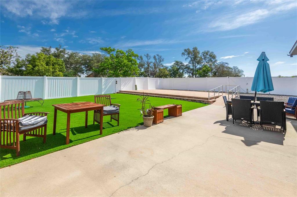 Undisclosed Address Spring Hill, FL 34608 - Photo 21 of 39 a view of swimming pool with a patio