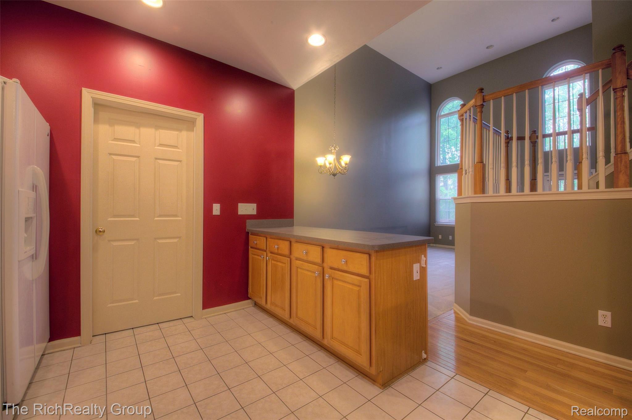 41796 Glade Road, Unit 43 Canton, MI 48187 - Photo 14 of 35 Peninsula provides even more storage and buffet space for entertaining