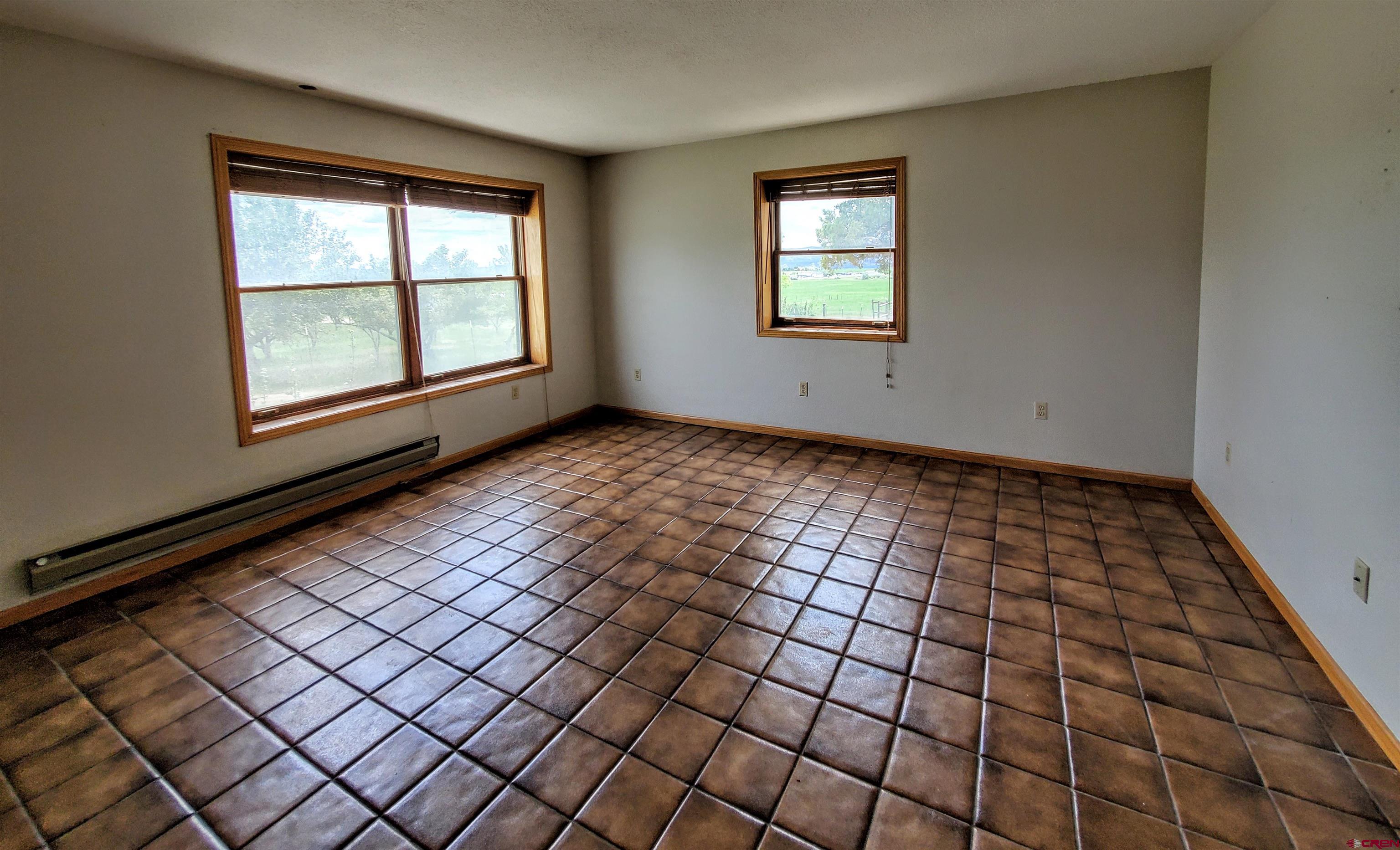 79 Cedar Circle Durango, CO 81303 - Photo 27 of 30 a view of empty room with windows