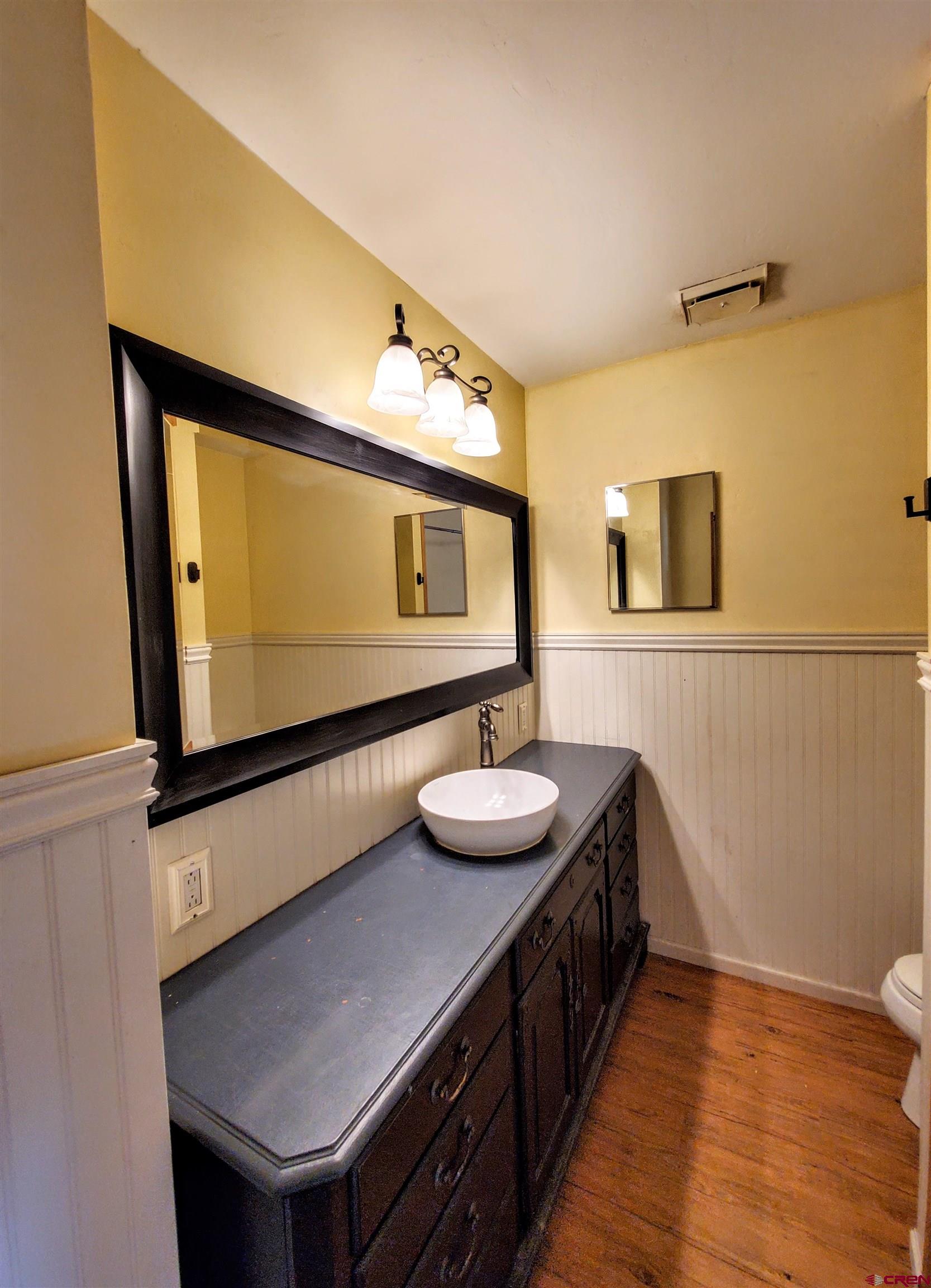 79 Cedar Circle Durango, CO 81303 - Photo 28 of 30 a bathroom with a sink and a mirror