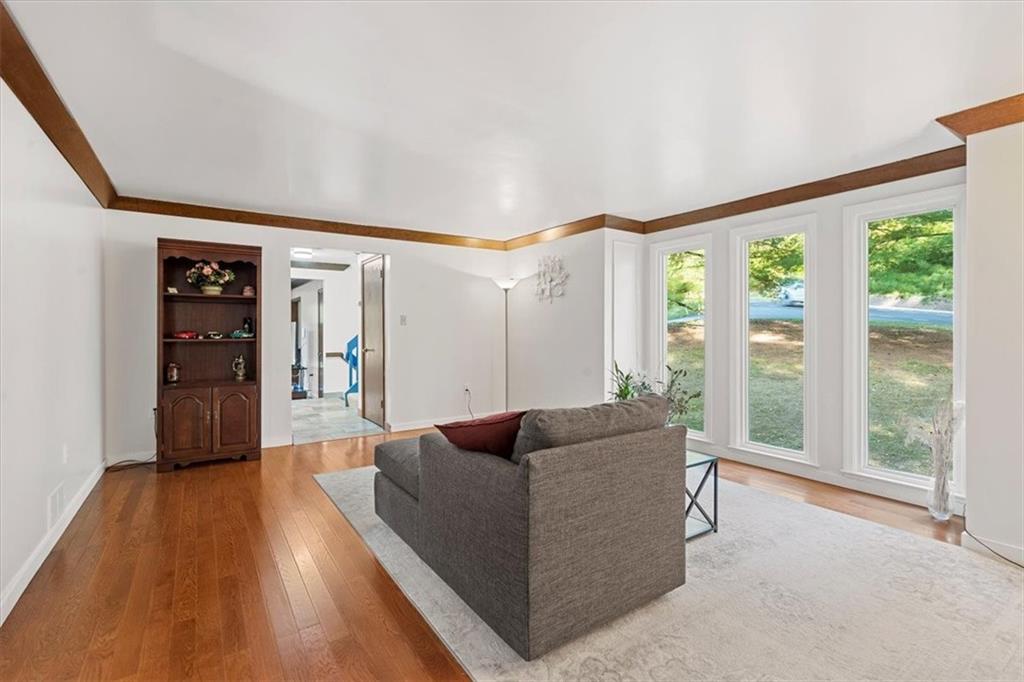 2239 Old Washington Road Pittsburgh, PA 15241 - Photo 11 of 37 a living room with furniture and a large window